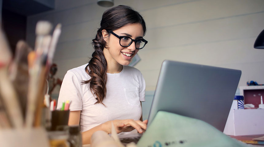 woman using laptop - 5 Safety Tips for Michigan Online Gambling